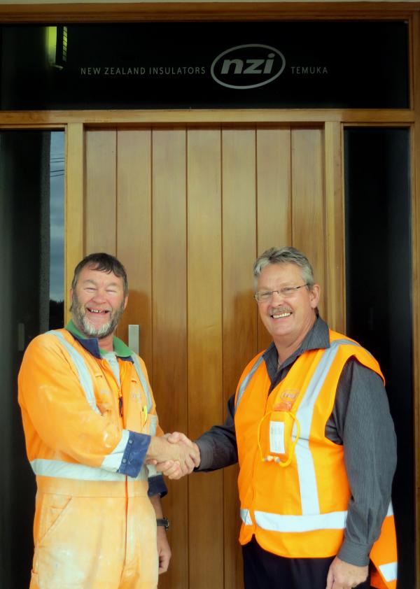 Warren Cornelius congratulated on 35 years service with NZI, May 2015